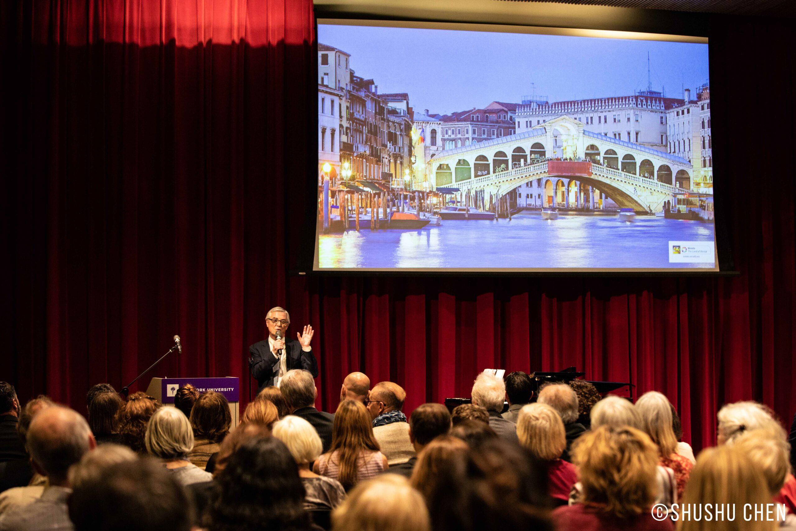 speaker-talking-and-spectators-from-veneto-the-land-of-venice-at-nyu