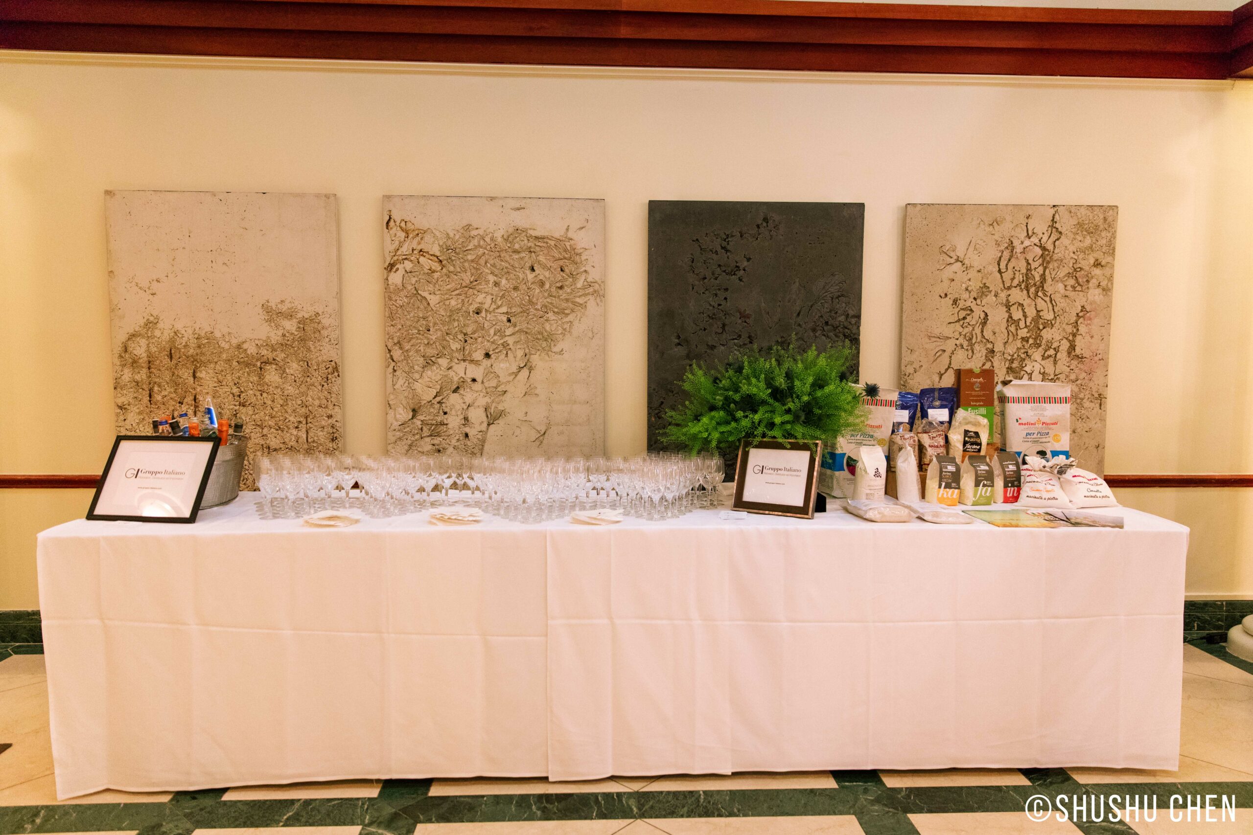 packaged-flour-and-food-items-and-glasses-and-wine-from-italian-table-talks-grains-at-casa-italiana