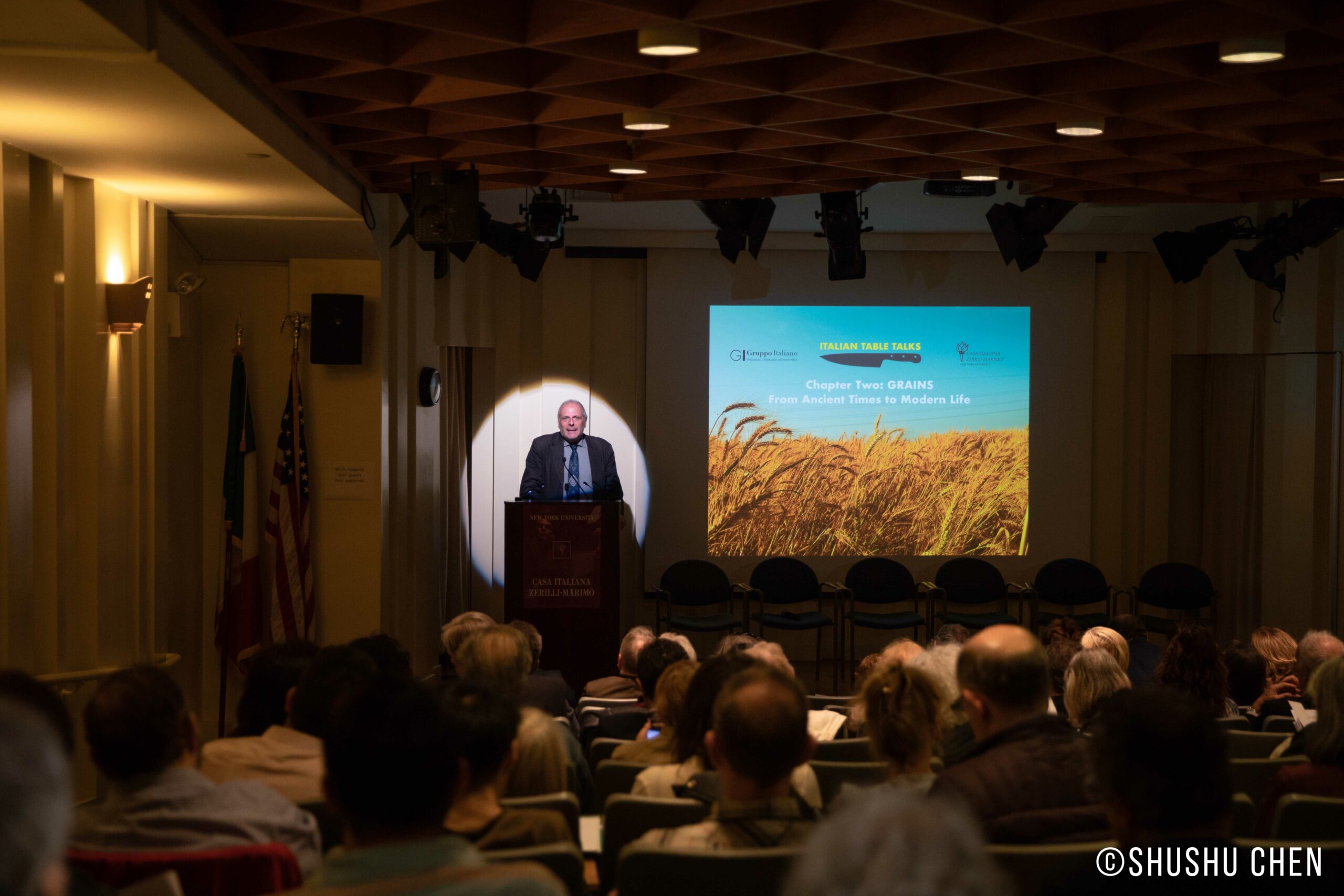 stefano-talking-image-being-displayed-on-projector-screen-from-italian-table-talks-grains-at-casa-italiana