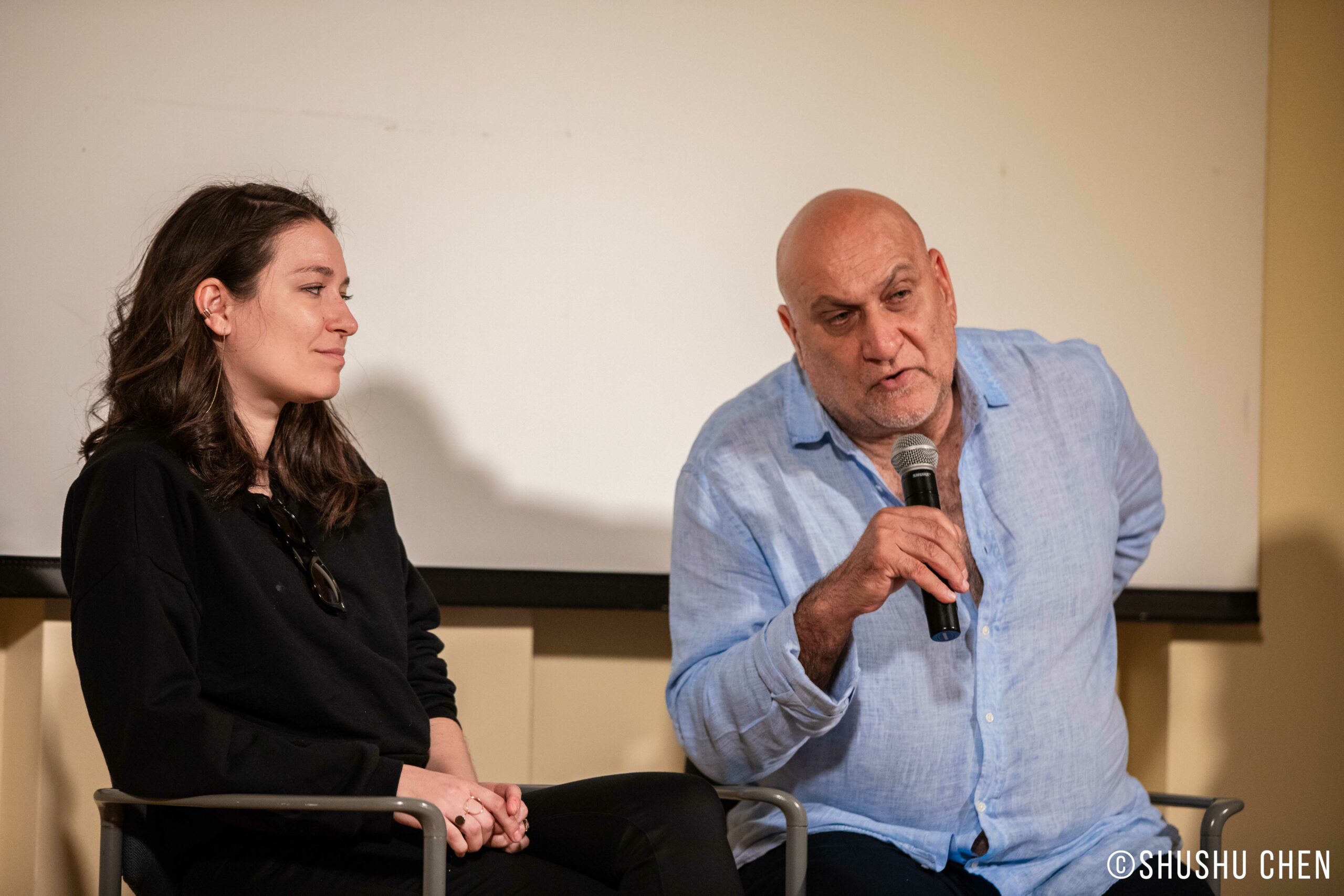 speaker-talking-from-conference-on-theaters-changing-relationships-at-casa-italiana