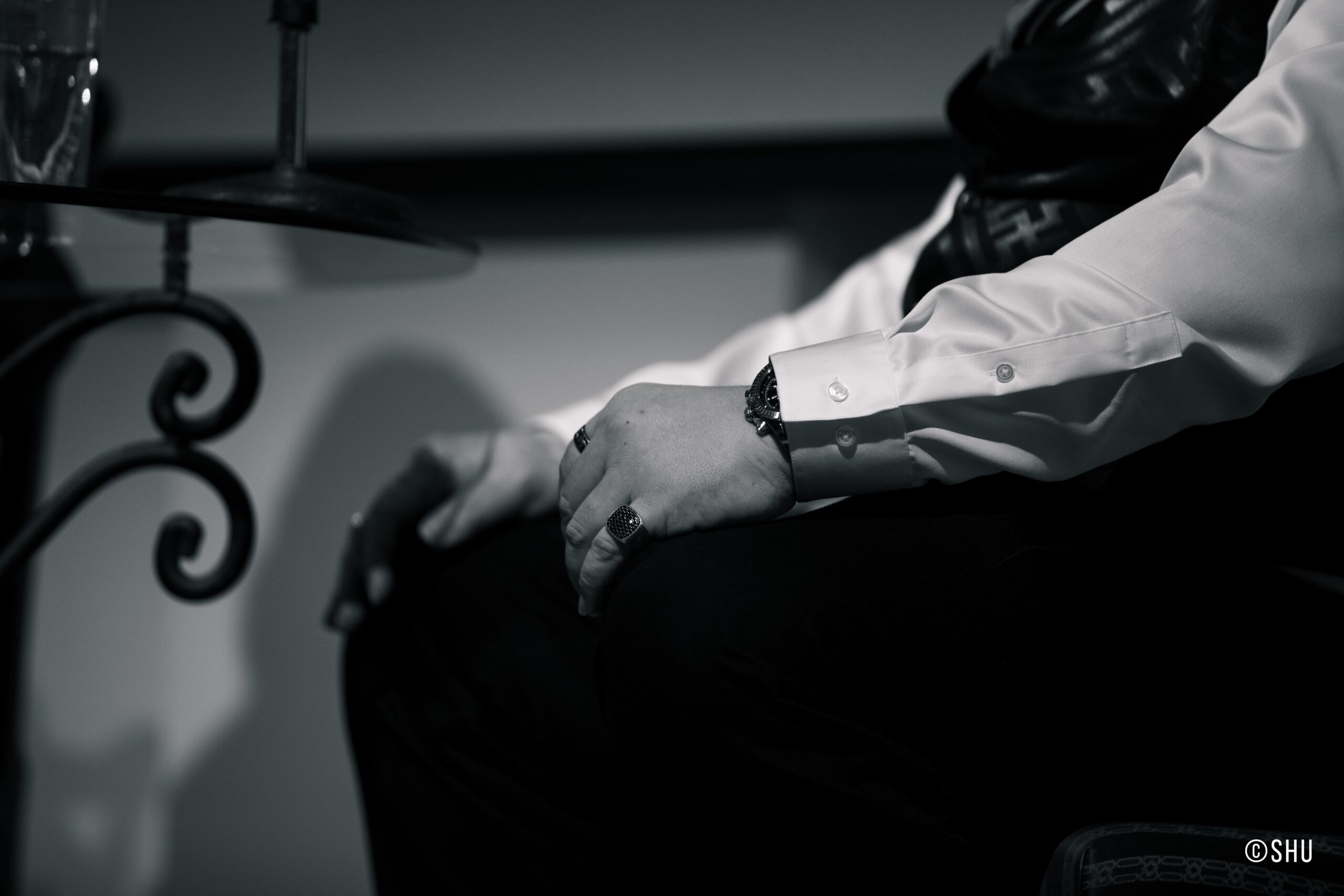 closeup-on-speakers-rings-and-watch-from-adventures-in-italian-opera-quinn-kelsey-at-casa-italiana