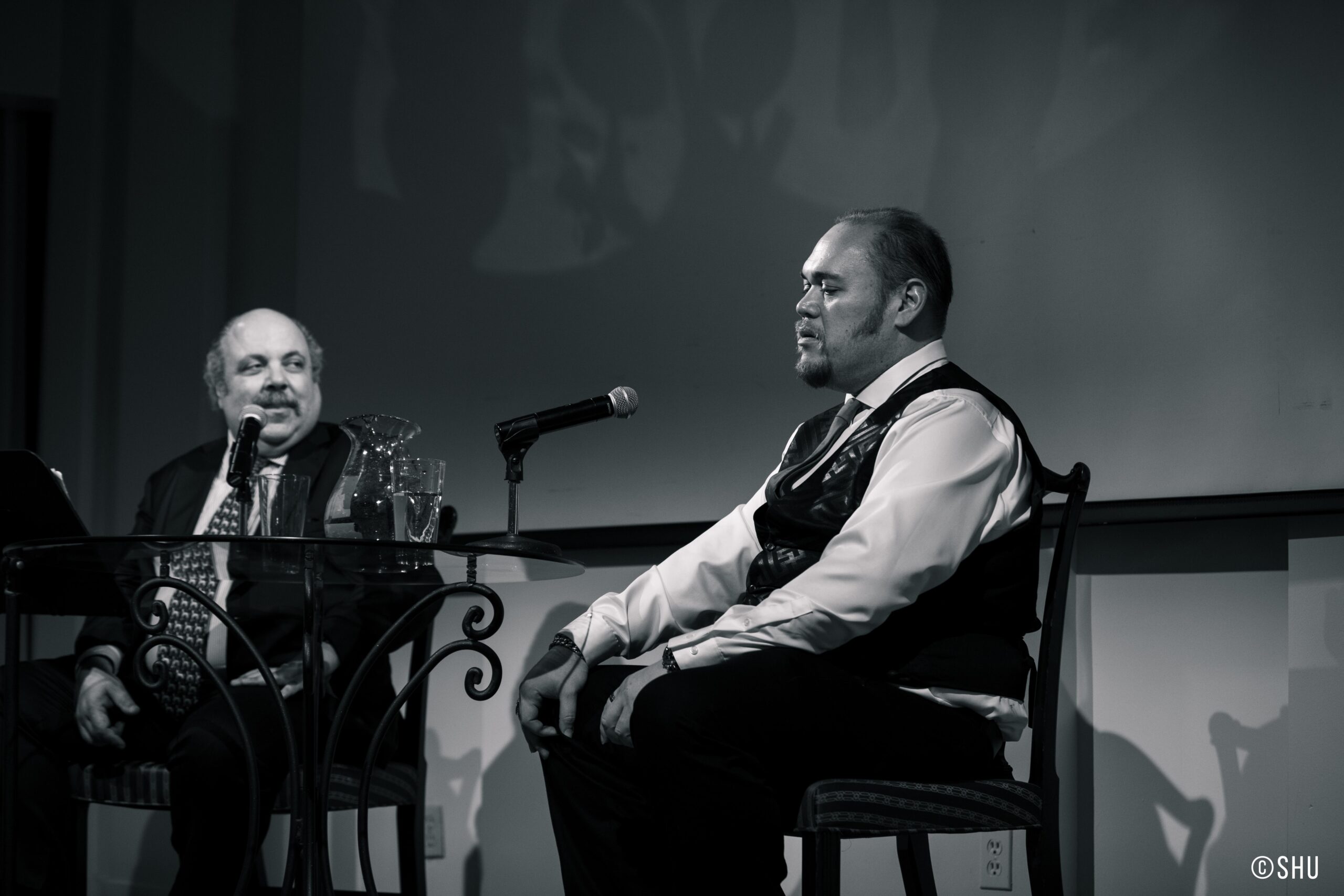 speaker-talking-from-adventures-in-italian-opera-quinn-kelsey-at-casa-italiana