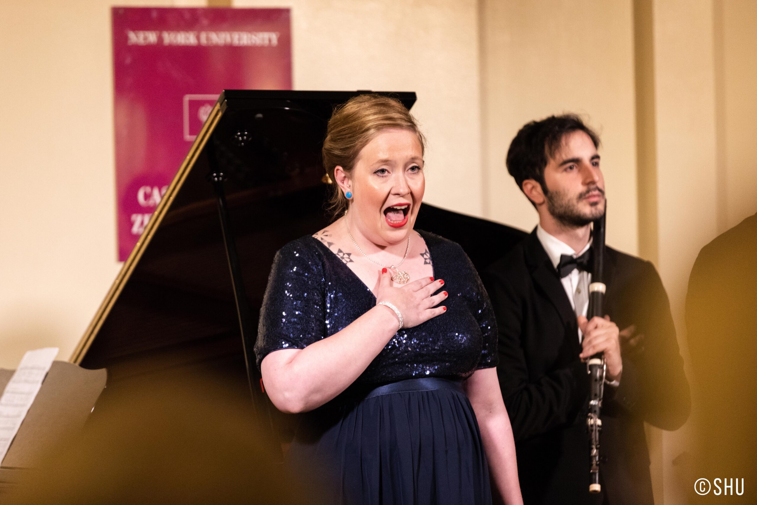 singer-performing-and musician-with-flute-from-concert-ibla-foundation-winners-at-casa-italiana