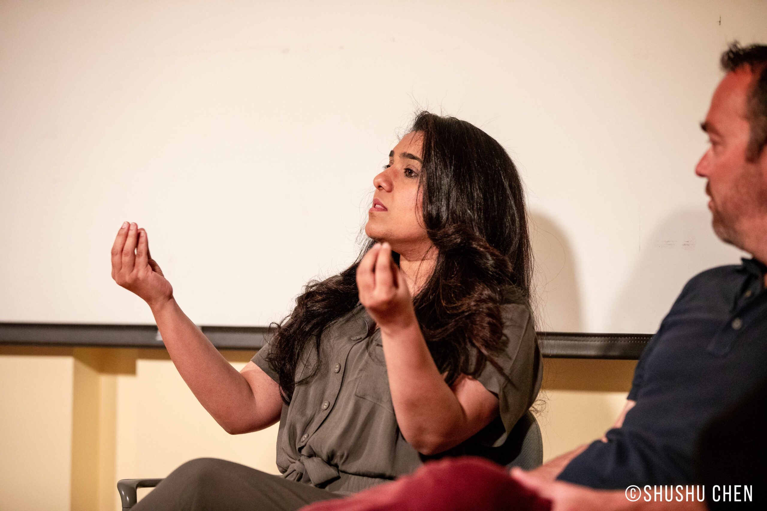 speaker-talking-from-conference-on-theaters-changing-relationships-at-casa-italiana