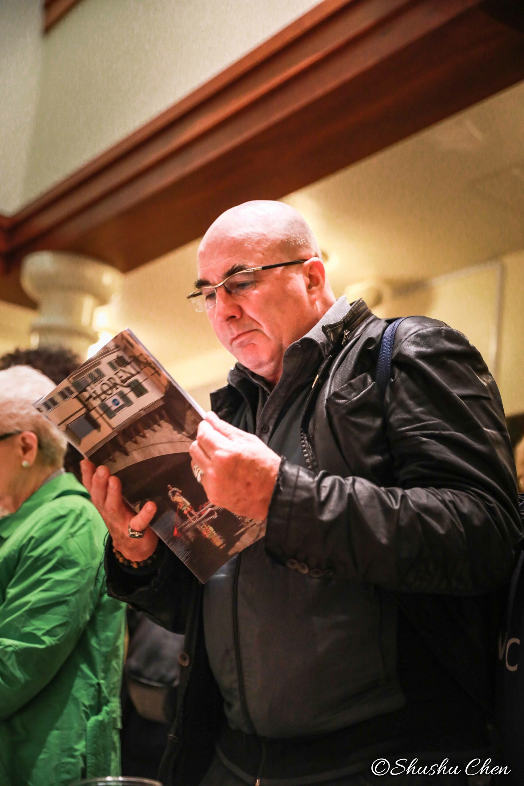 man-seeing-book-from-neorealism-and-photography-at-casa-italiana