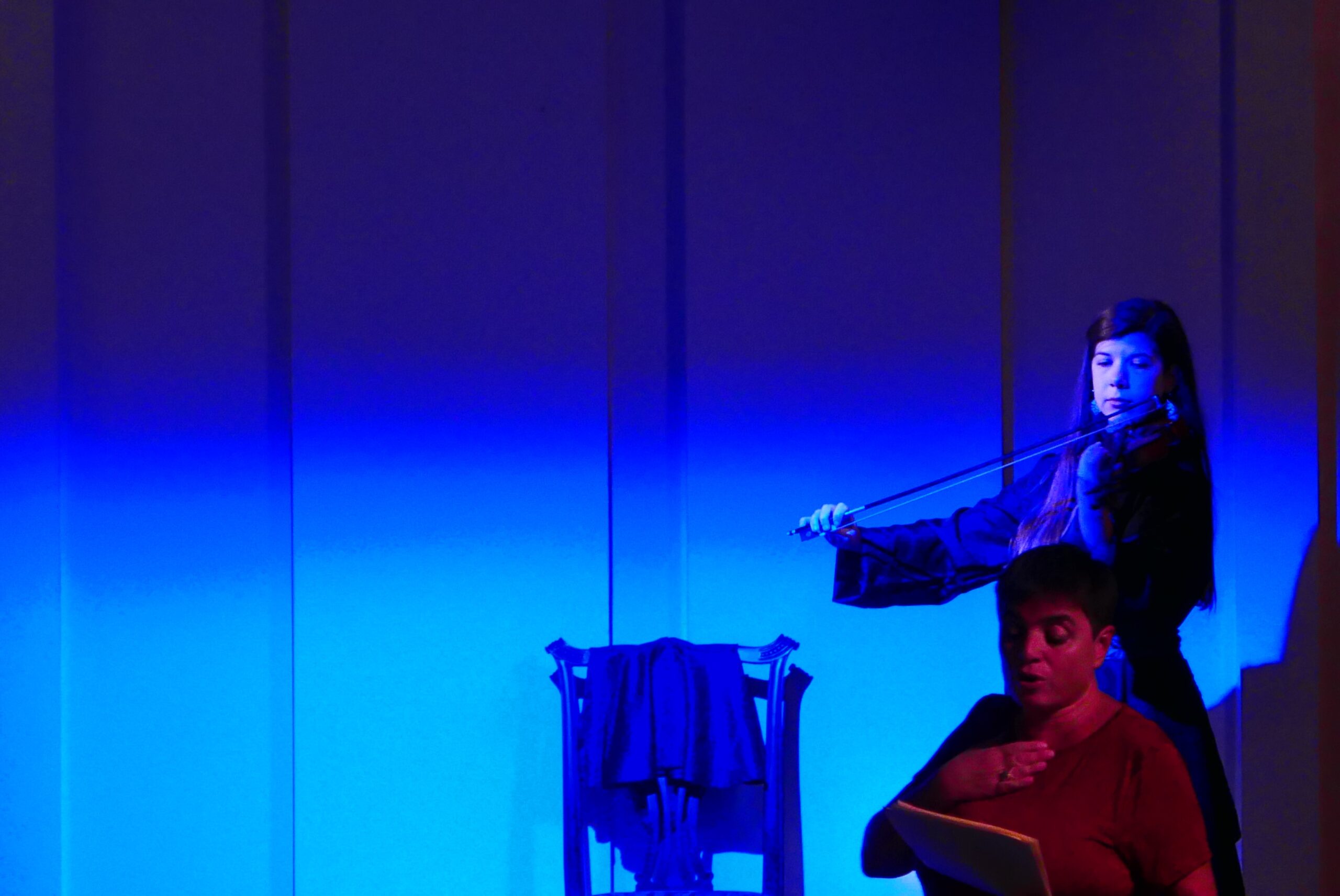 artist-performing-and-musician-playing-violin-from-spettacolo-su-elena-cornaro-piscopia-at-casa-italiana