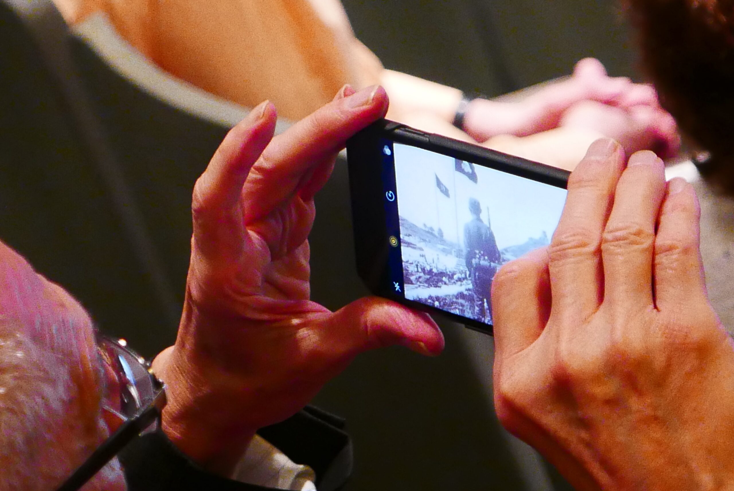 spectator-taking-picture-from-anthony-hechts-italian-journey-at-casa-italiana