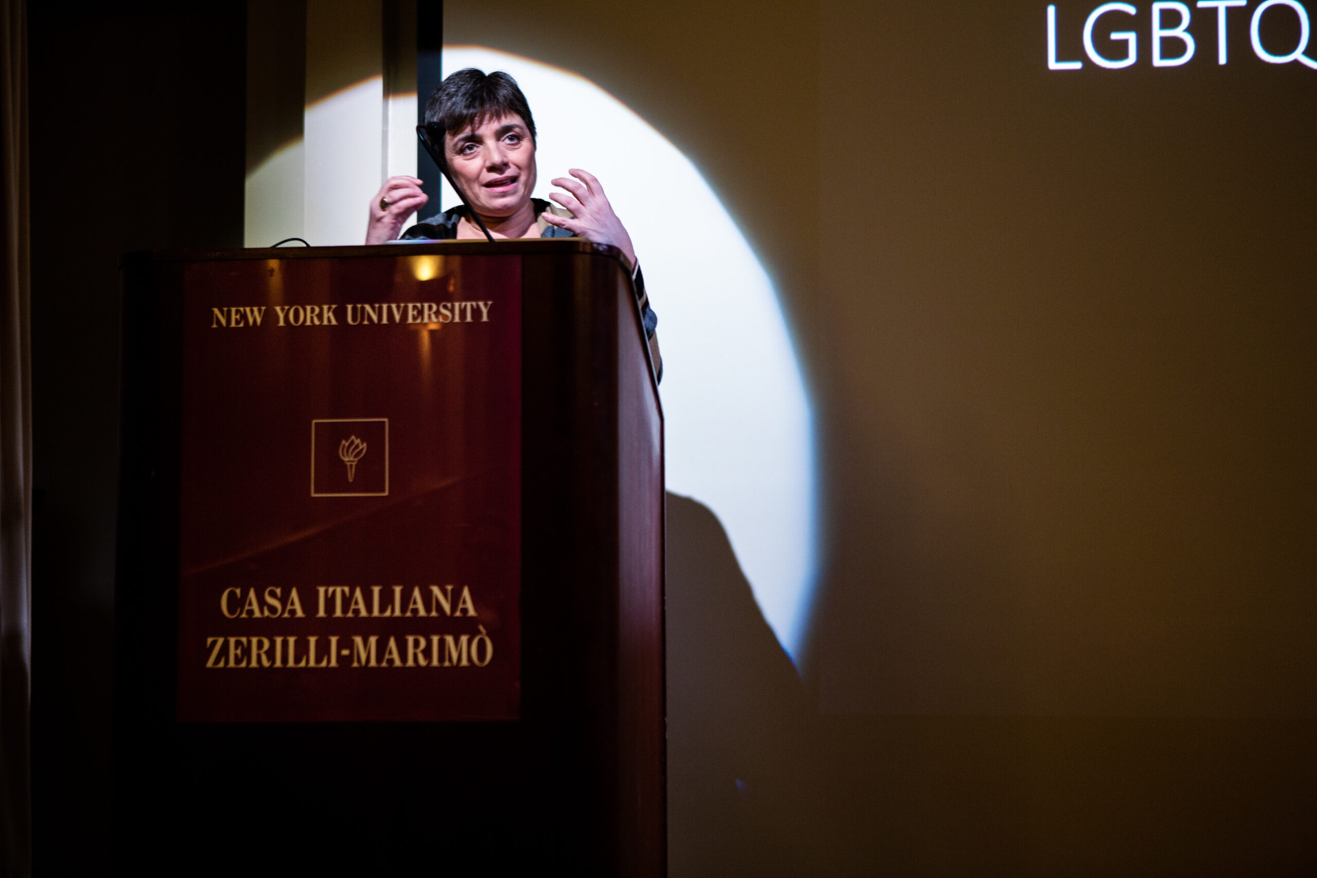 speaker-talking-from-lgbtq-in-italian-american-theater-at-casa-italiana