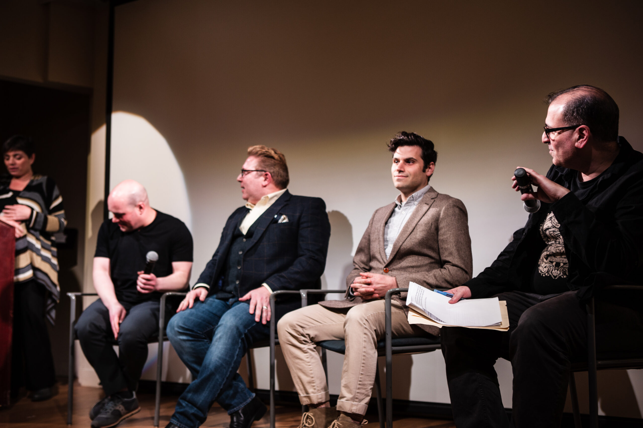 speaker-talking-from-lgbtq-in-italian-american-theater-at-casa-italiana